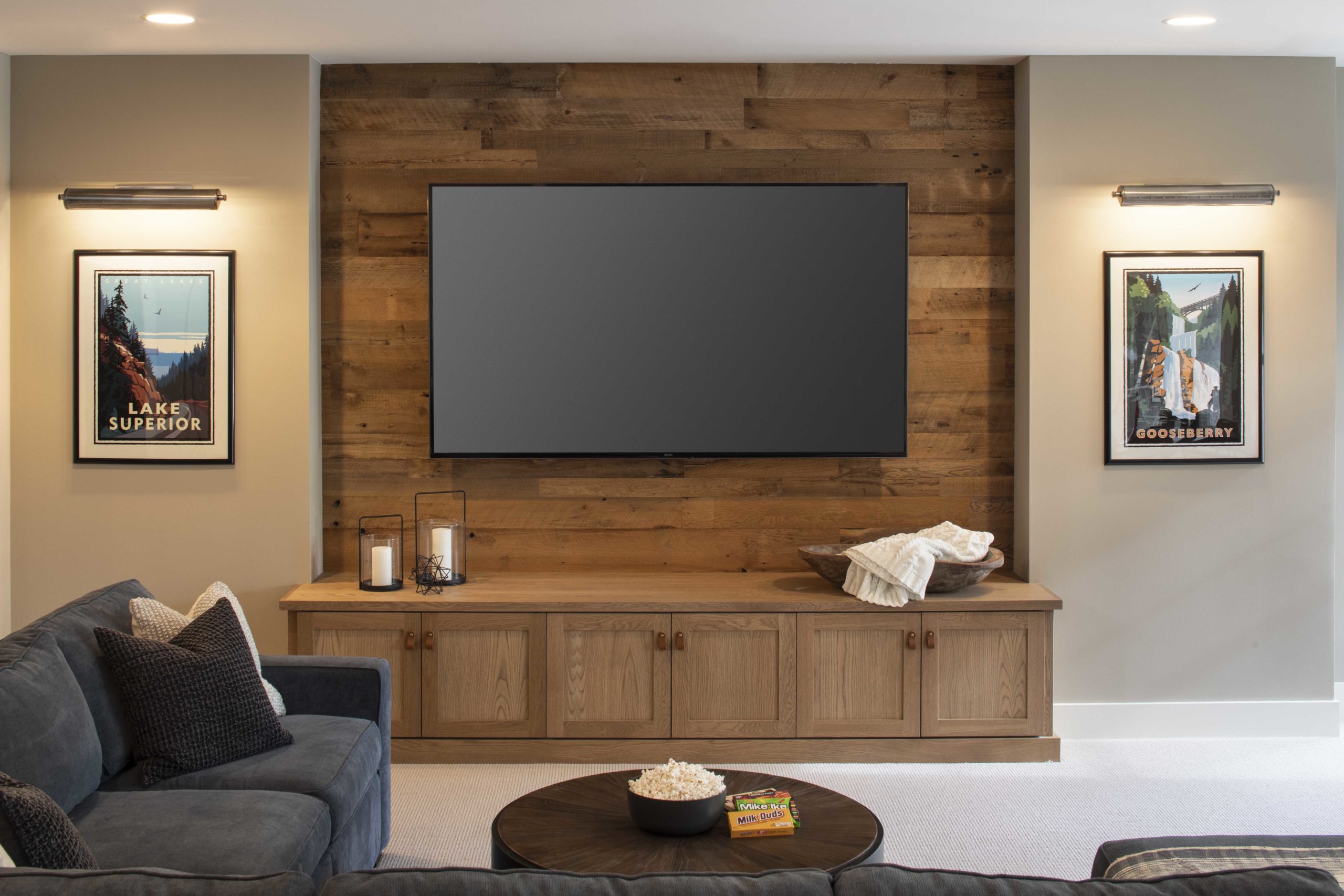 television mounted on wood plank wall