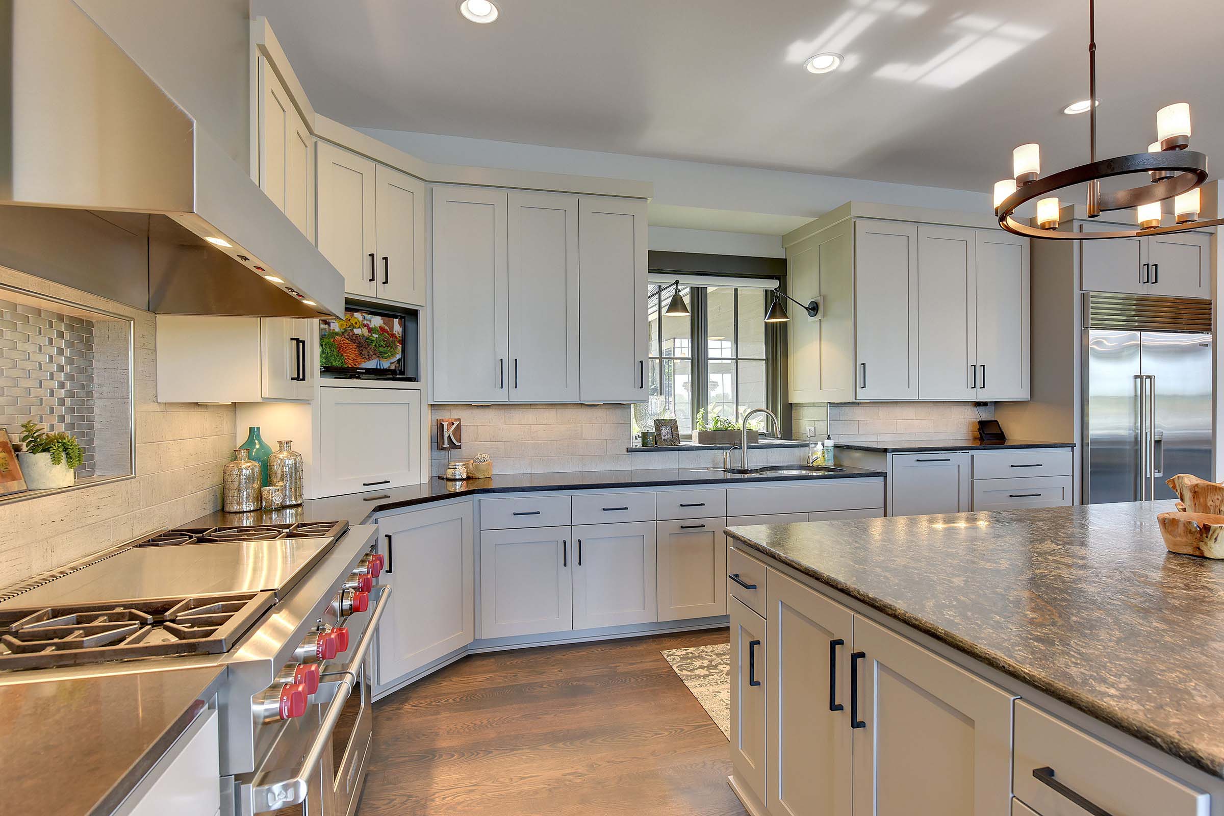 Kitchens portfolio with white cabinets and granite counter tops.