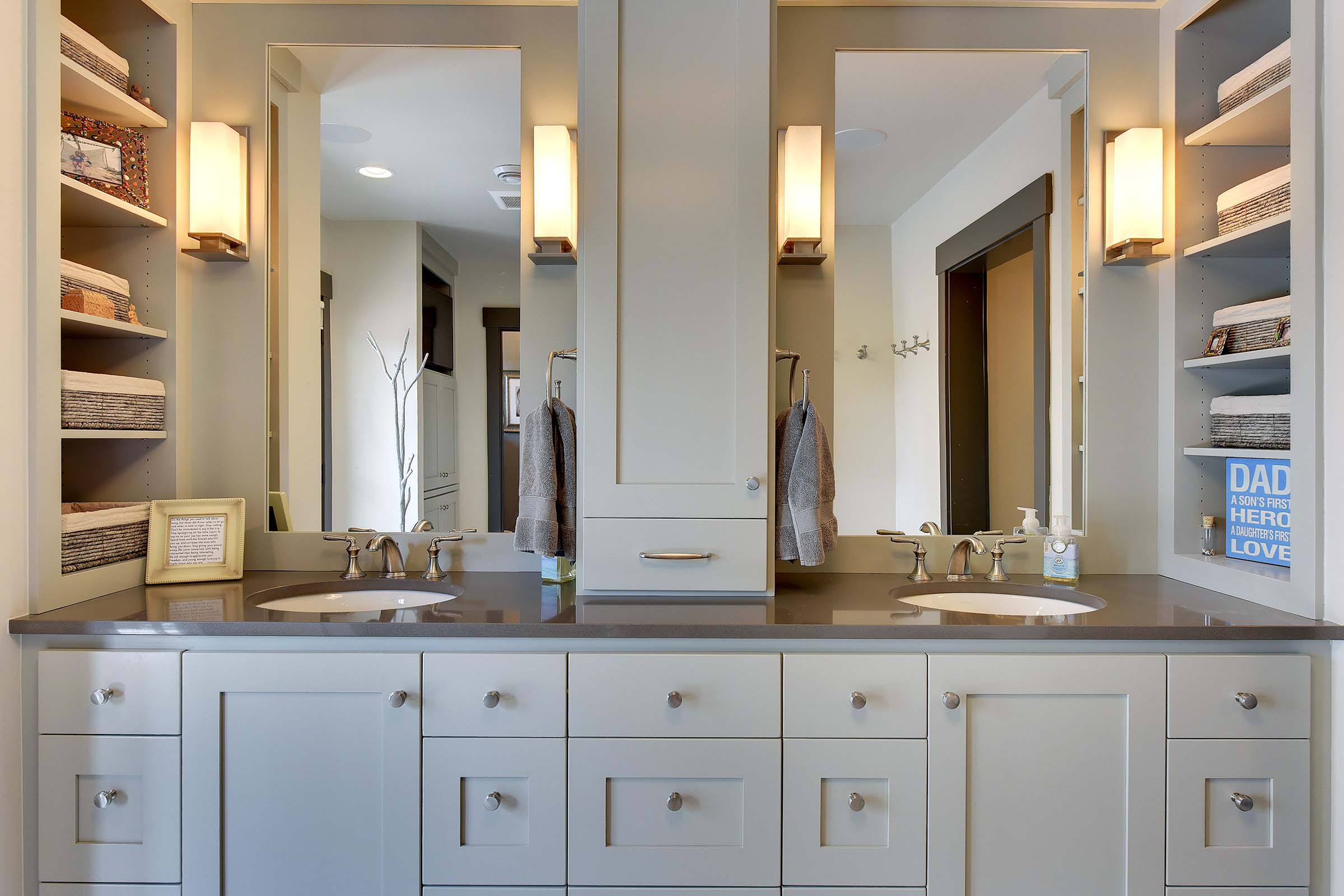 A bathroom with two sinks, perfect for your Kitchens portfolio.