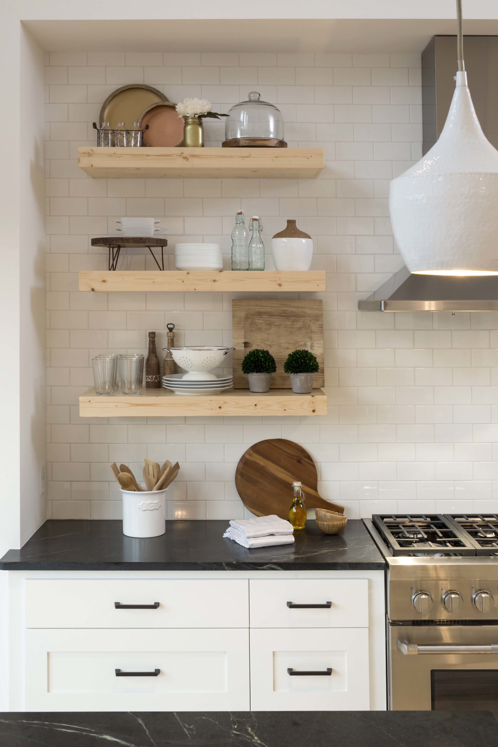 open kitchen shelving decorated with farmhouse style decor