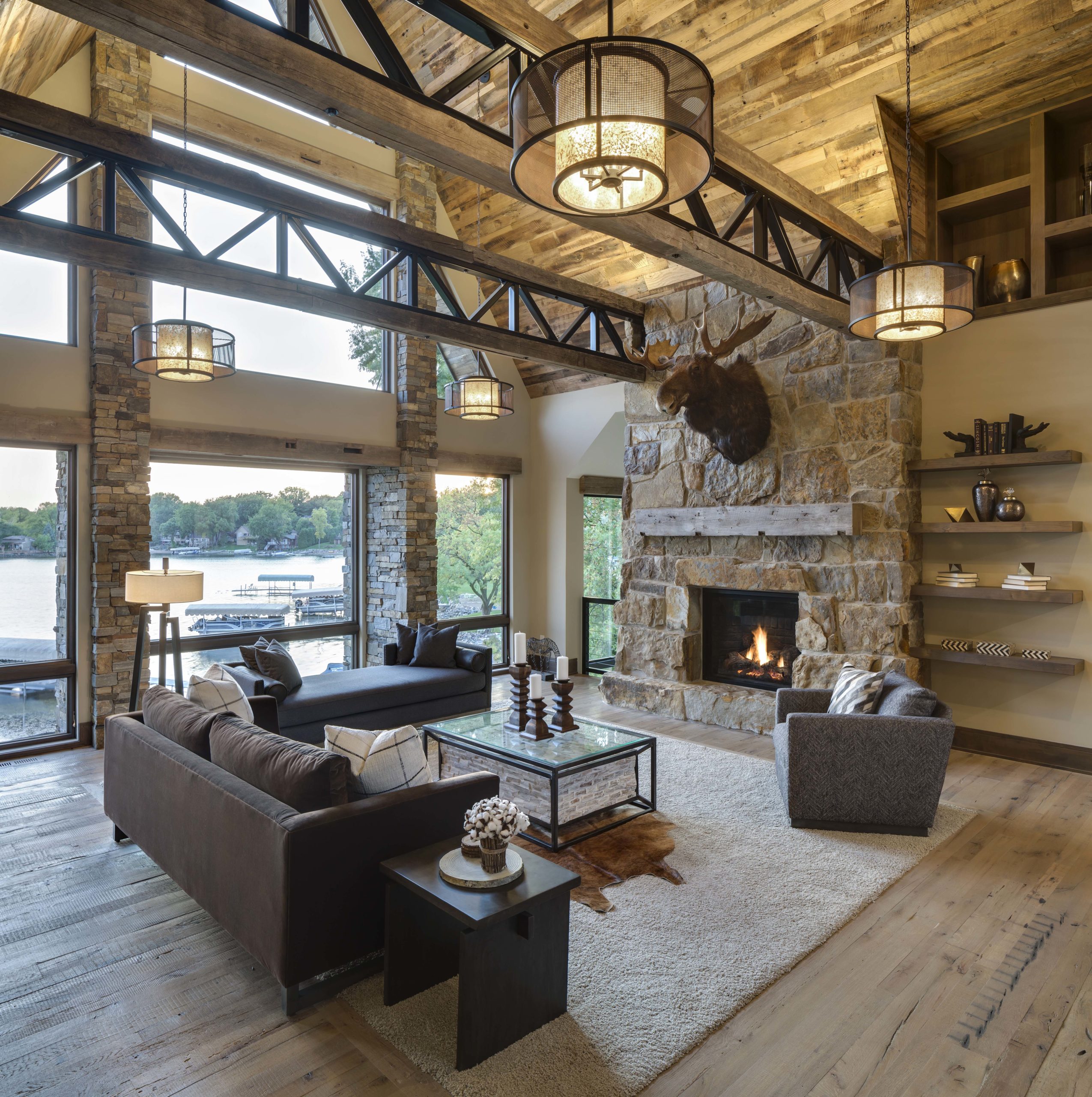 cabin style living room with stone and wood accents