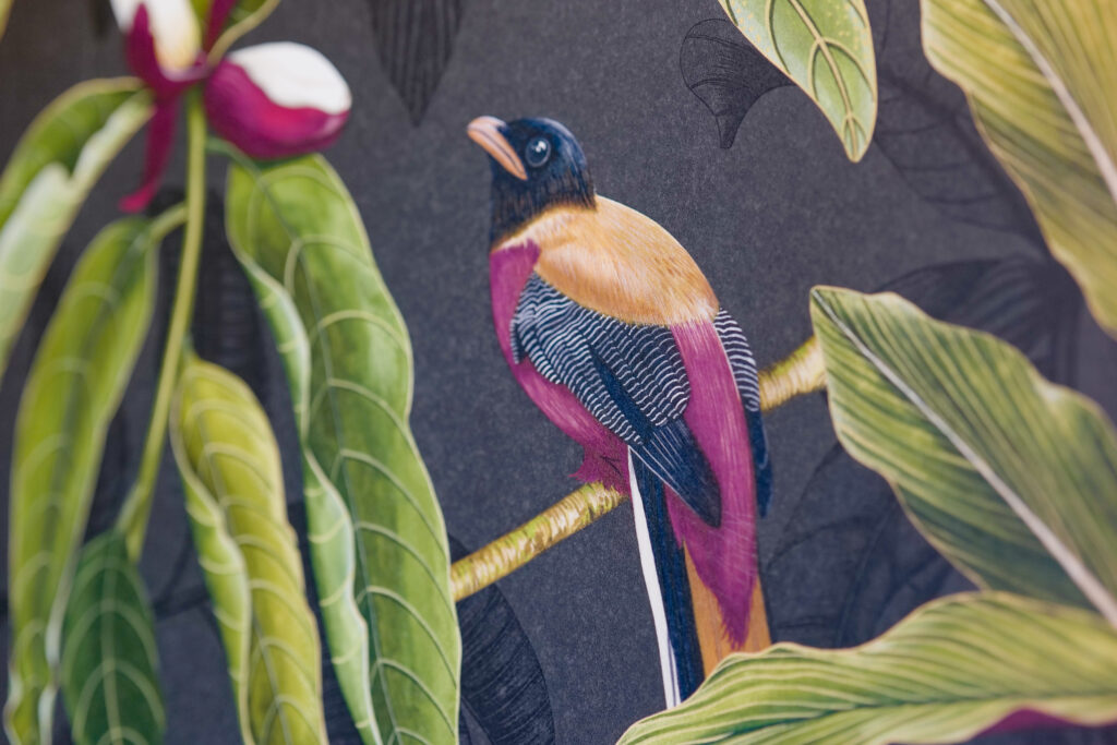 A modern painting of a bird perched on a branch with a Tuscan touch.