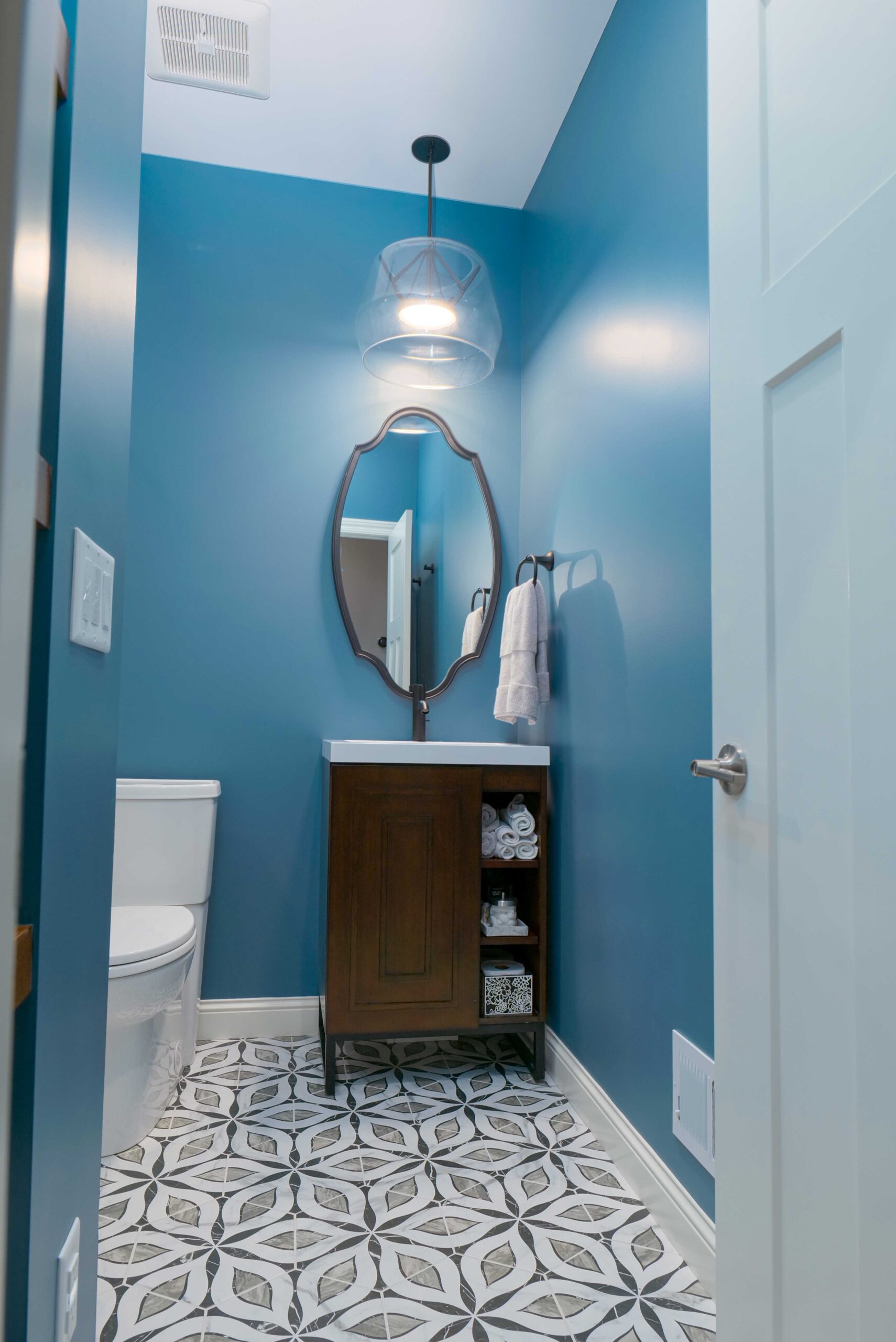 An Orchard Lake remodel with blue walls and a tiled floor.